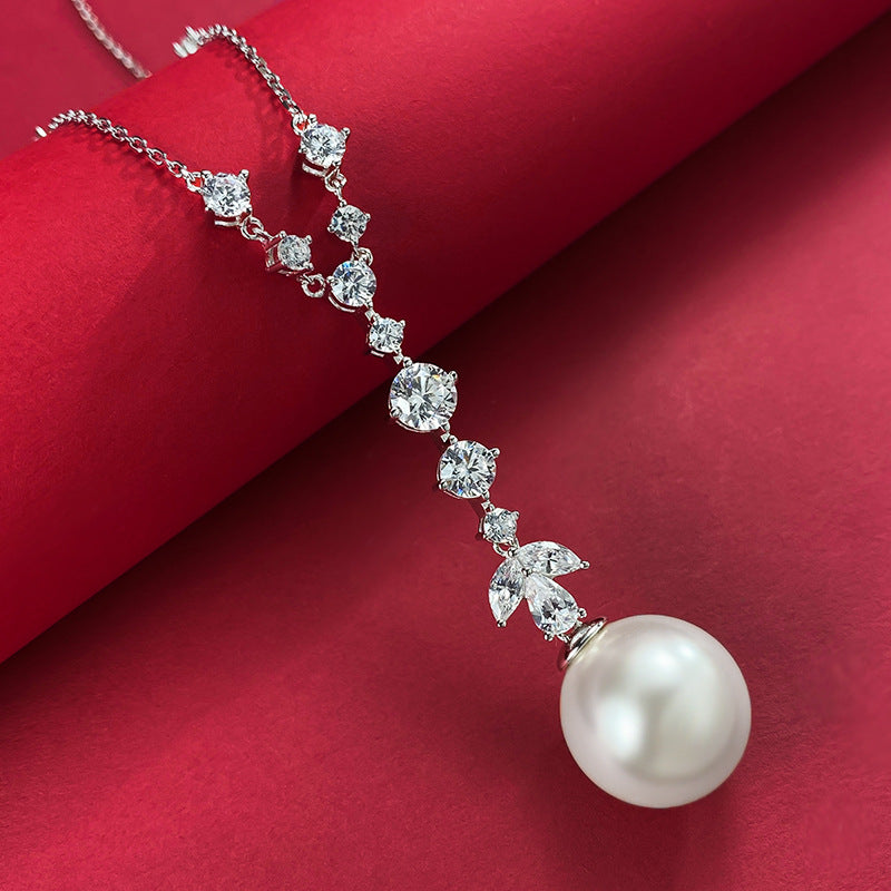 Urqanyu S925 silver tassel pearl 16mm fashionable cubic zirconia necklace