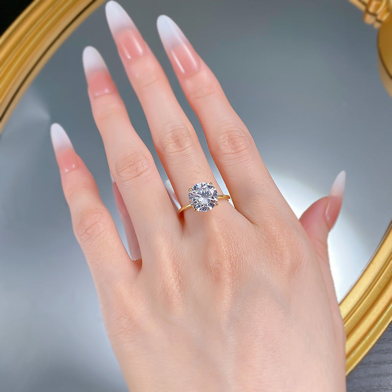 Urqanyu S925 silver four-claw round cubic zirconia diamond ring