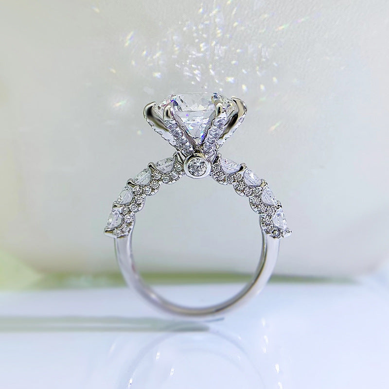 Urqanyu S925 silver 5 carat firework cut aurora six-claw cubic zirconia ring