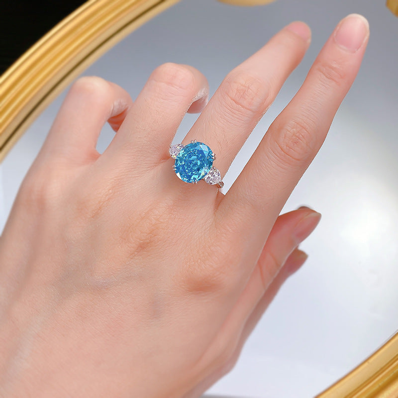 Urqanyu S925 silver sea blue ice flower cut oval cubic zirconia ring 10*12