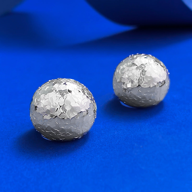 Urqanyu S925 sterling silver sparkling flashing broken ice ice light ball pine cone earrings fashionable cold style
