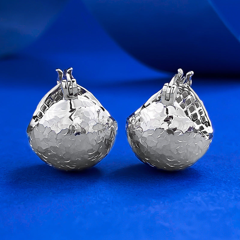 Urqanyu S925 sterling silver sparkling flashing broken ice ice light ball pine cone earrings fashionable cold style