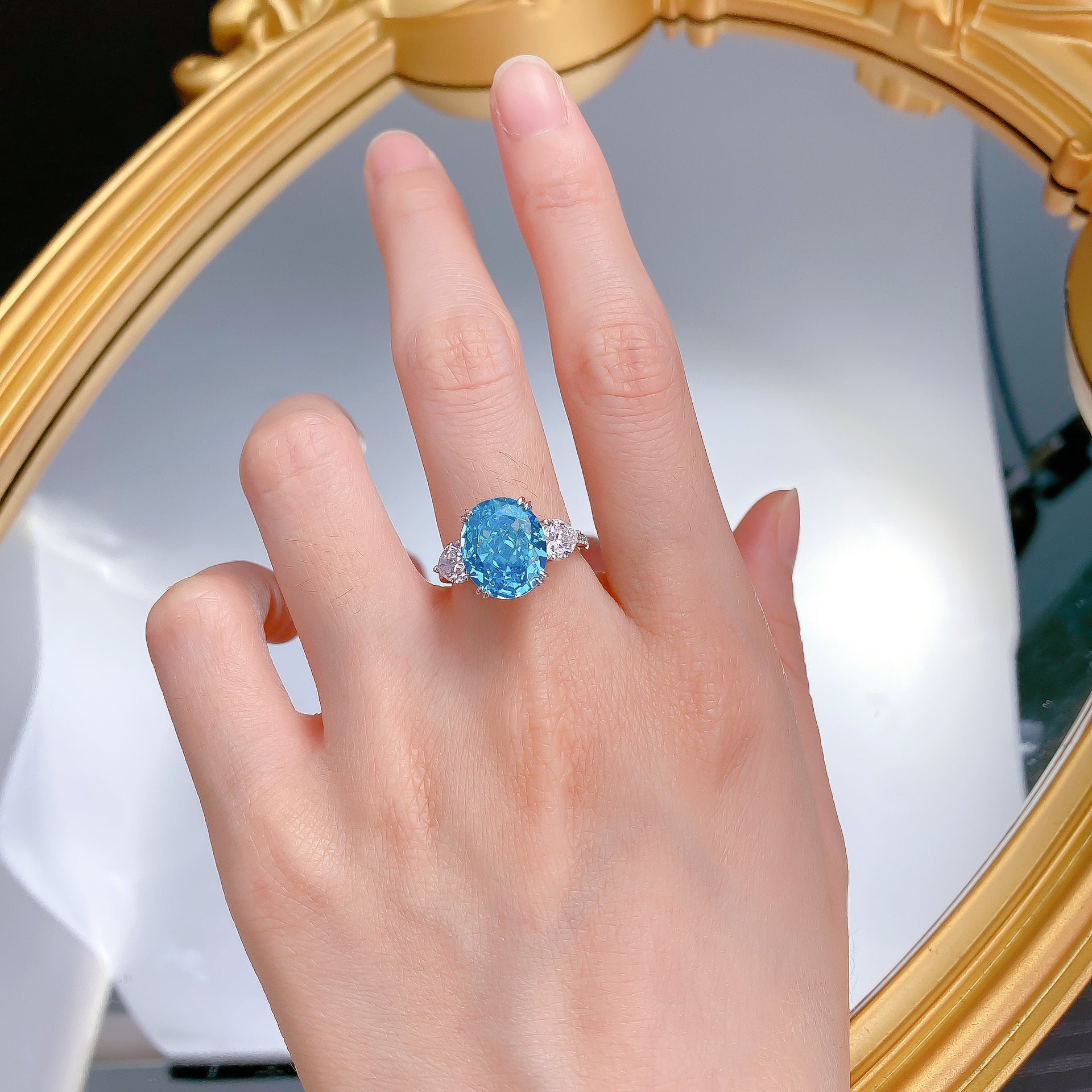 Urqanyu S925 silver sea blue ice flower cut oval cubic zirconia ring 10*12
