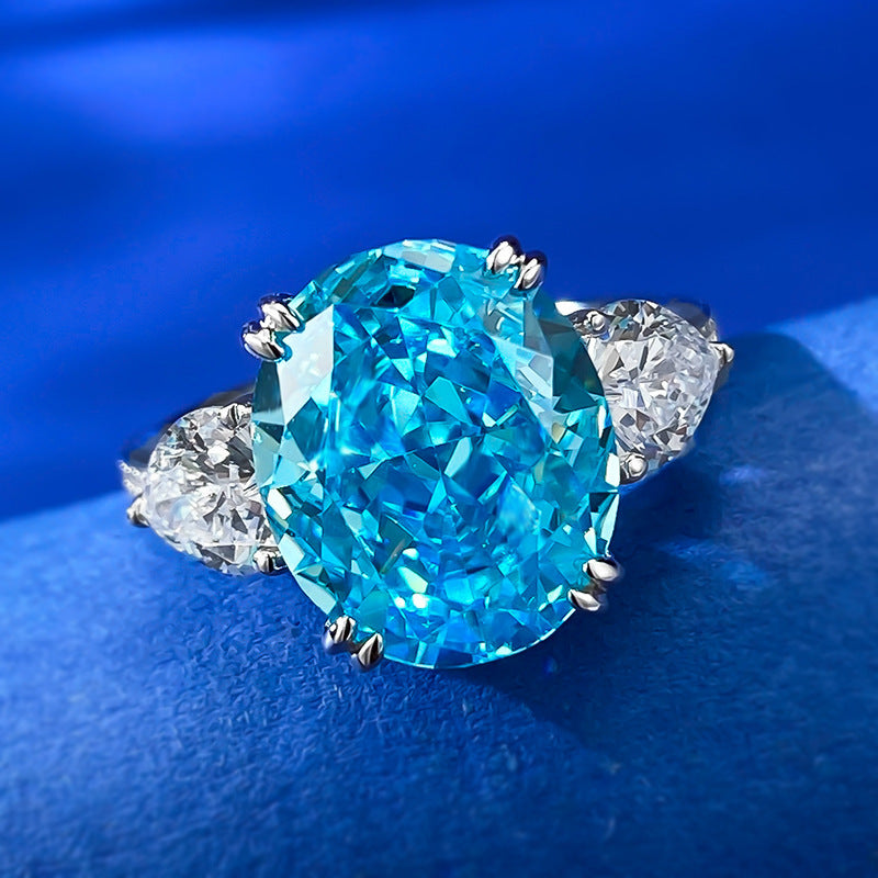 Urqanyu S925 silver sea blue ice flower cut oval cubic zirconia ring 10*12