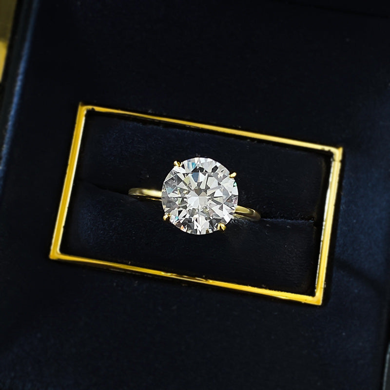 Urqanyu S925 silver four-claw round cubic zirconia diamond ring