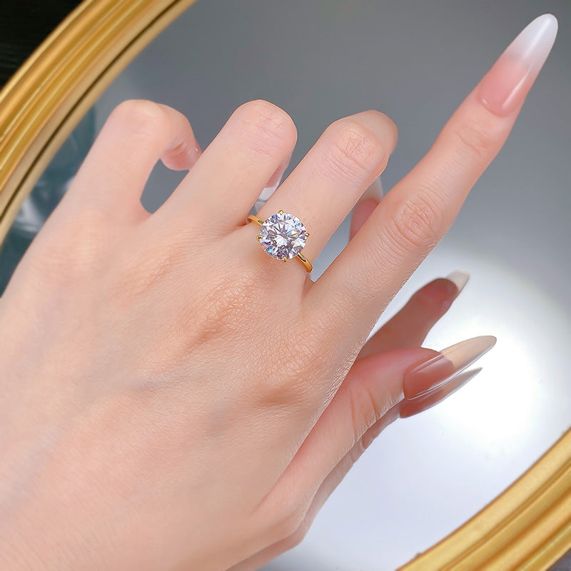 Urqanyu S925 silver four-claw round cubic zirconia diamond ring