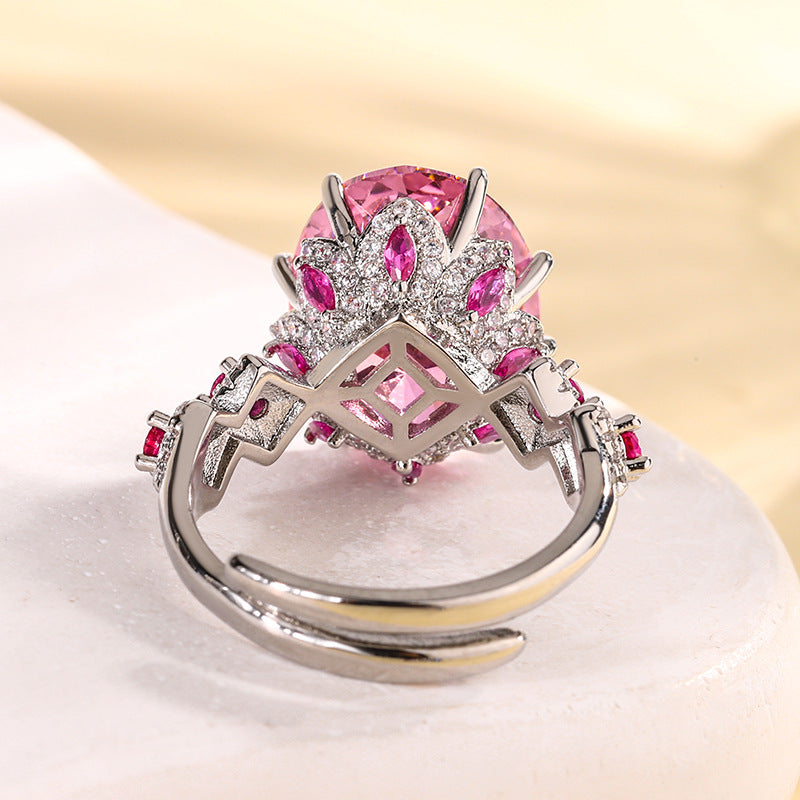 Urqanyu copper base gold-plated simulated colored gem corundum egg-shaped jump color creative cubic zirconia ring