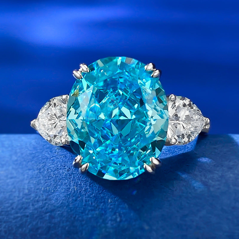 Urqanyu S925 silver sea blue ice flower cut oval cubic zirconia ring 10*12