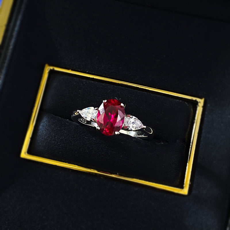Urqanyu S925 silver fashion simulation pigeon blood red oval red corundum cubic zirconia ring 6*8