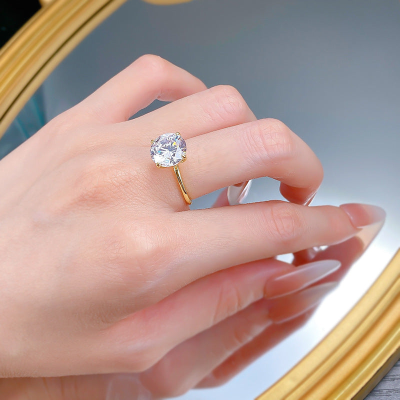 Urqanyu S925 silver four-claw round cubic zirconia diamond ring