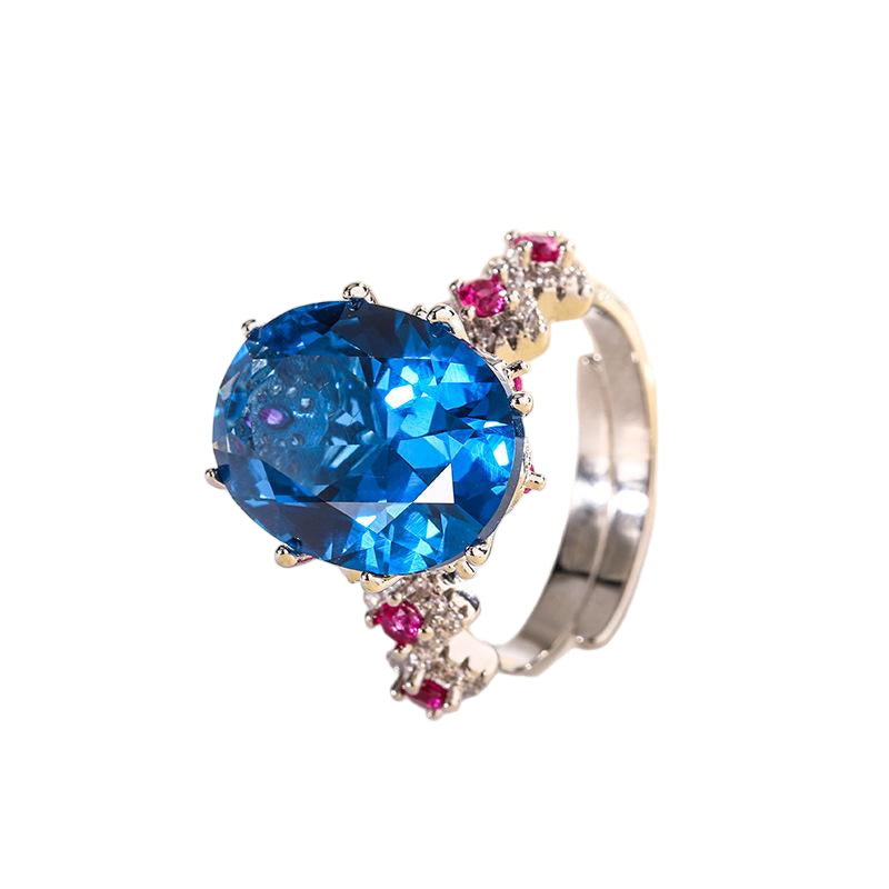 Urqanyu copper base gold-plated simulated colored gem corundum egg-shaped jump color creative cubic zirconia ring