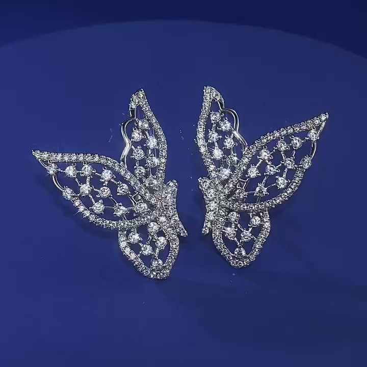 Load video: Urqanyu S925 silver hollow butterfly simple cubic zirconia earrings