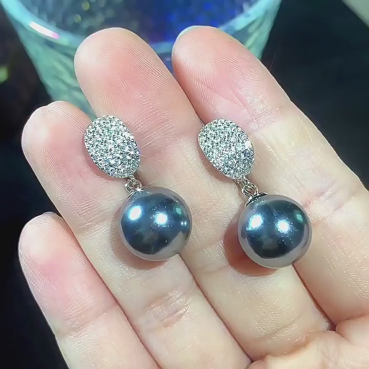 Load video: Urqanyu S925 Silver Inlay Mother of Pearl Fashion Cubic Zirconia Drop Earrings 12mm