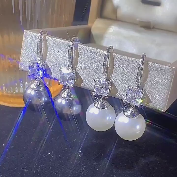 Load video: Urqanyu copper base gold-plated inlaid pearl square cubic zirconia fashion pendant earrings 14mm