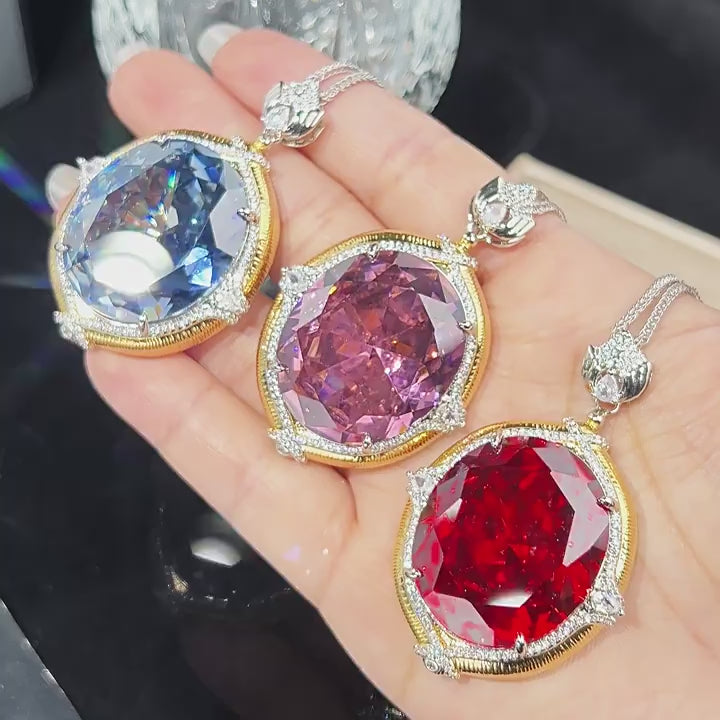 Load video: Urqanyu copper-based gold-plated simulated colored gemstone large egg-shaped retro brushed process cubic zirconia necklace