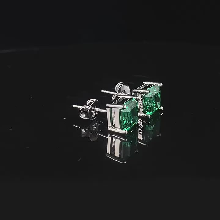 Load video: Urqanyu S925 silver simple 7*7mm emerald pagoda car flat simulation diamond four-claw cubic zirconia earrings