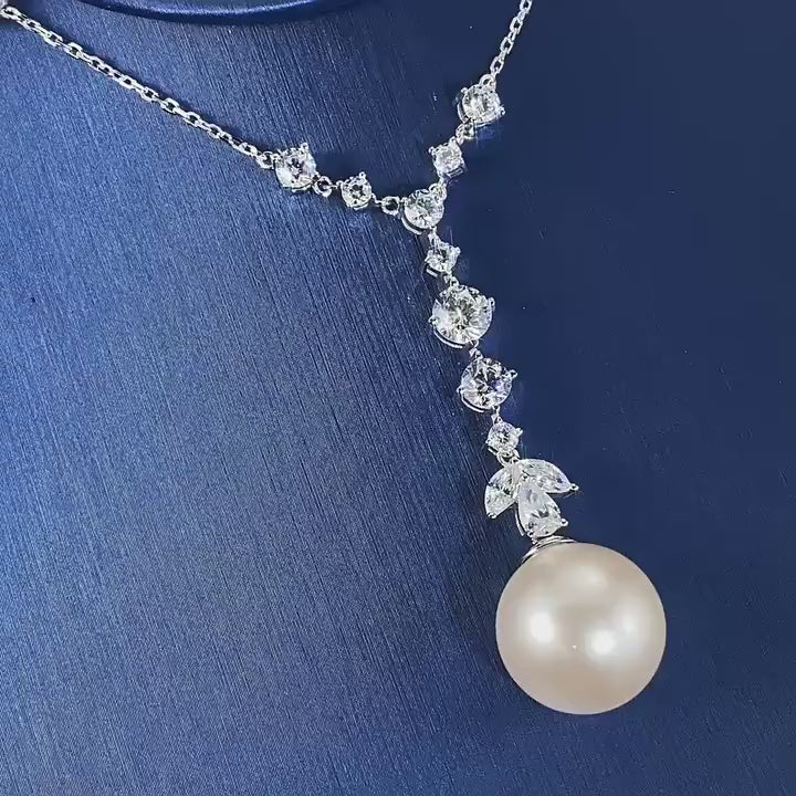 Load video: Urqanyu S925 silver tassel pearl 16mm fashionable cubic zirconia necklace