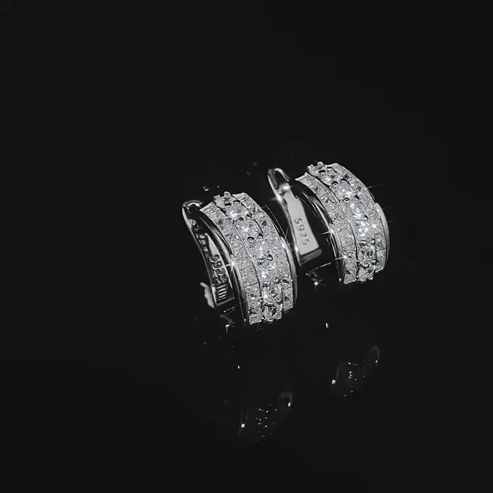 Load video: Urqanyu S925 silver temperament c-shaped earrings simple and cool style cubic zirconia earrings