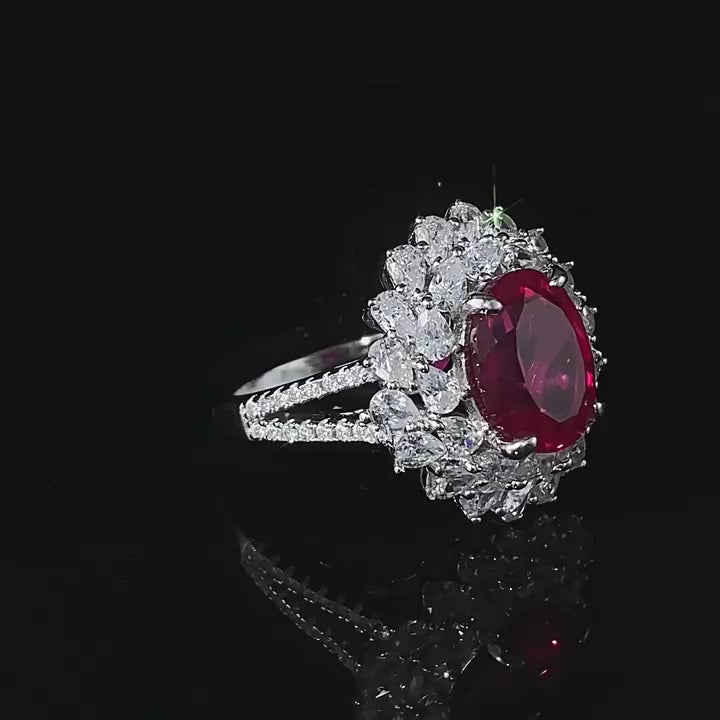 Load video: Urqanyu S925 silver pigeon blood red simulated diamond oval ring group inlaid flower cluster cubic zirconia wedding ring 8*10
