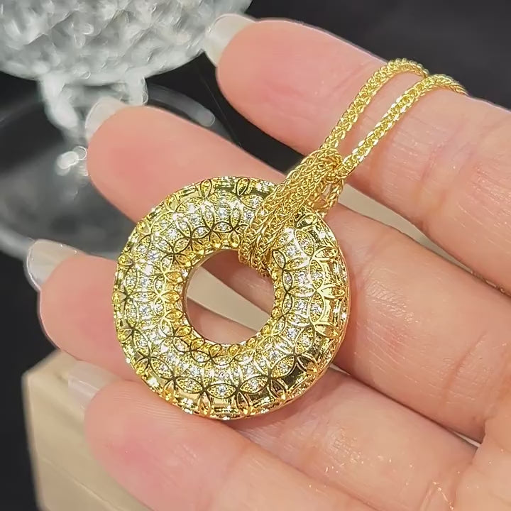 Load video: Urqanyu Copper-base gold-plated simulated gold filigree ancient coin pattern peace buckle cubic zirconia pendant necklace