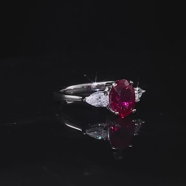 Load video: Urqanyu S925 silver fashion simulation pigeon blood red oval red corundum cubic zirconia ring 6*8